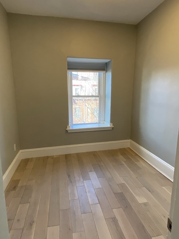 1 Wigglesworth Street, Unit 2 Boston, MA 02120 - Photo 23 of 23 a view of an empty room and window