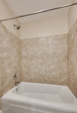 a bathroom with a sink vanity and a mirror