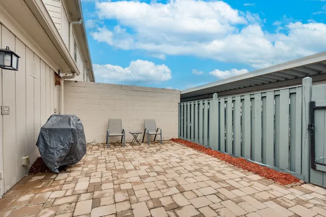 a view of a backyard of a house