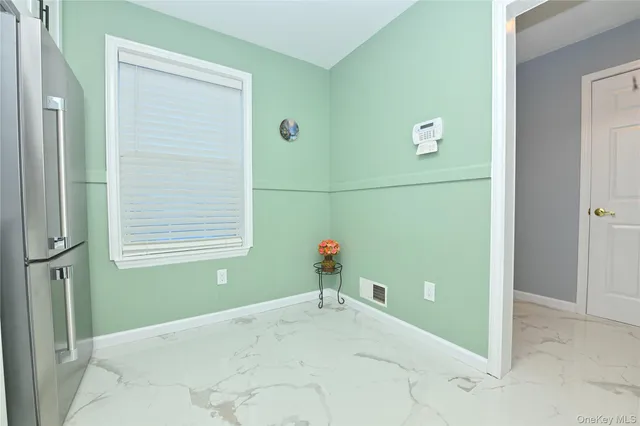 a view of a room with a window