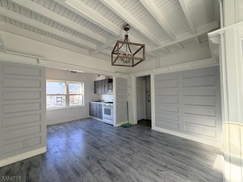 324 Summer Avenue, Unit 3 Newark, NJ 07104 - Photo 11 of 12 a view of empty room and kitchen
