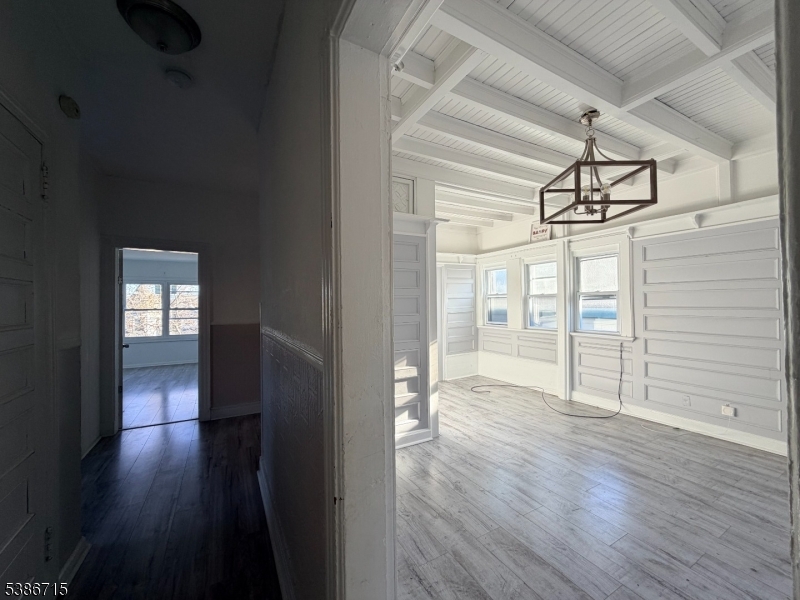 324 Summer Avenue, Unit 3 Newark, NJ 07104 - Photo 9 of 12 a view of hallway with wooden floor