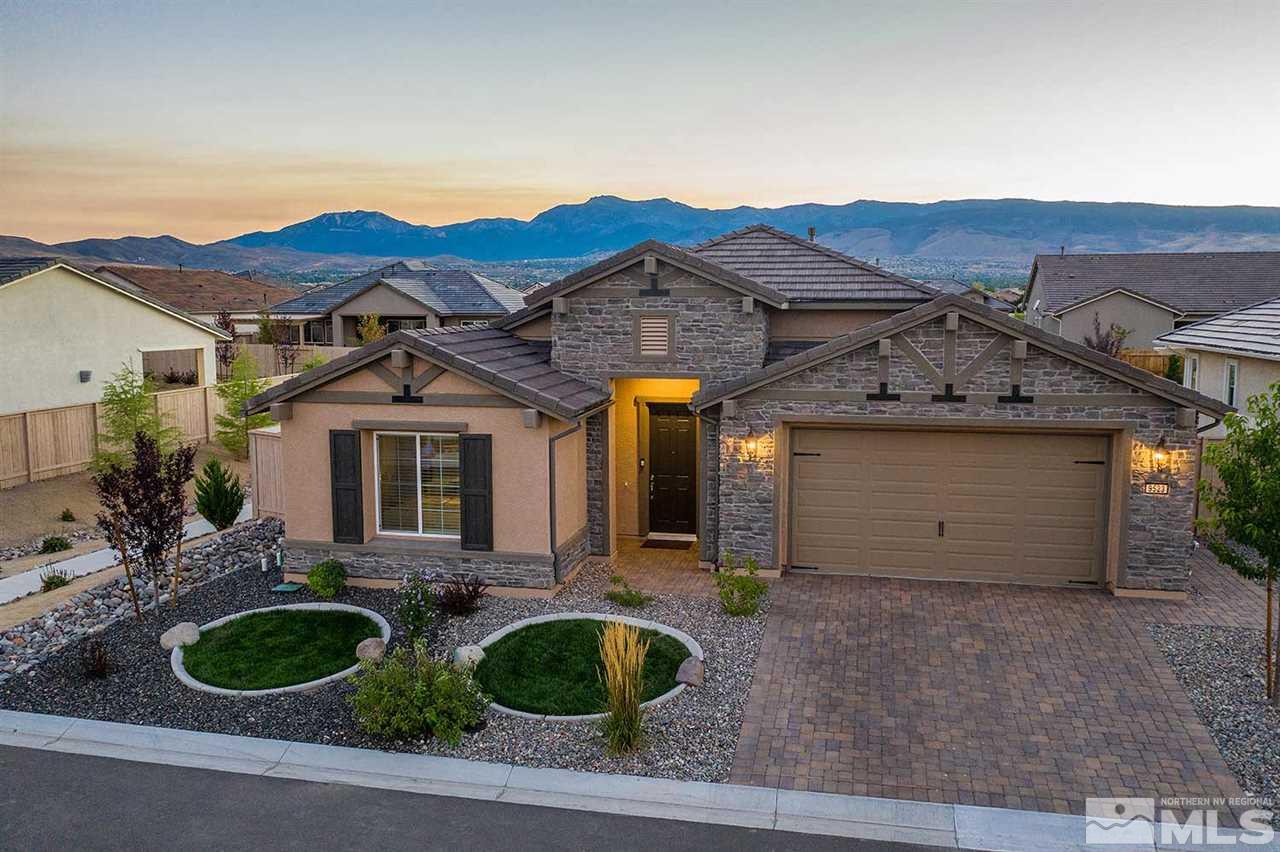 9523 Tencendur Lane Reno, NV 89521 - Photo 1 of 40 a front view of a house with garden