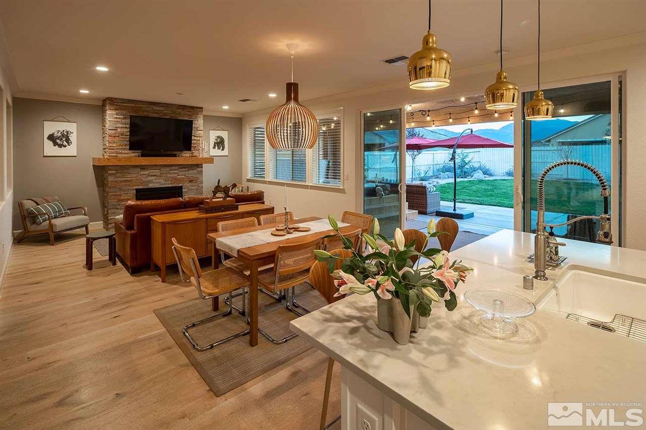 9523 Tencendur Lane Reno, NV 89521 - Photo 14 of 40 a view of a dining room with furniture window and outside view
