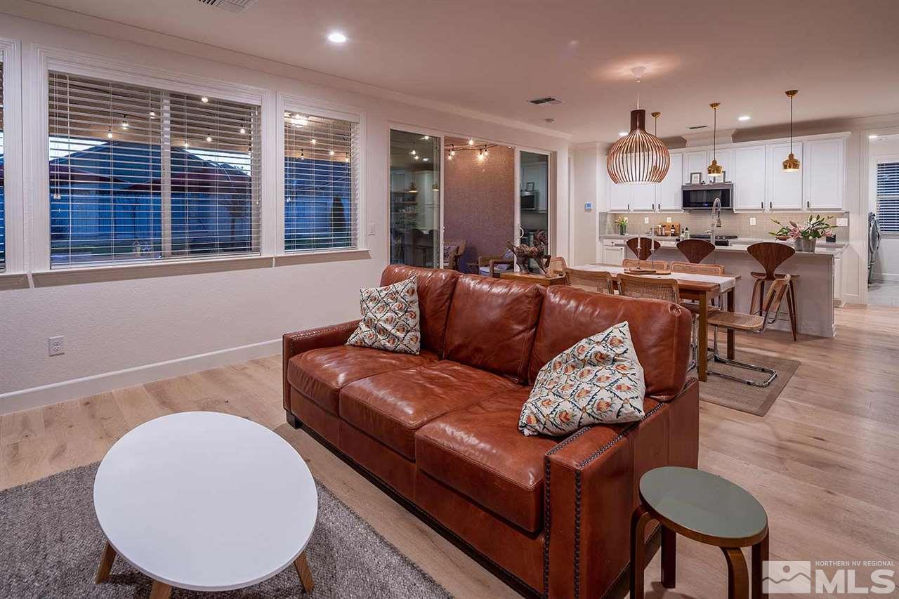 9523 Tencendur Lane Reno, NV 89521 - Photo 16 of 40 a living room with furniture kitchen and a large window