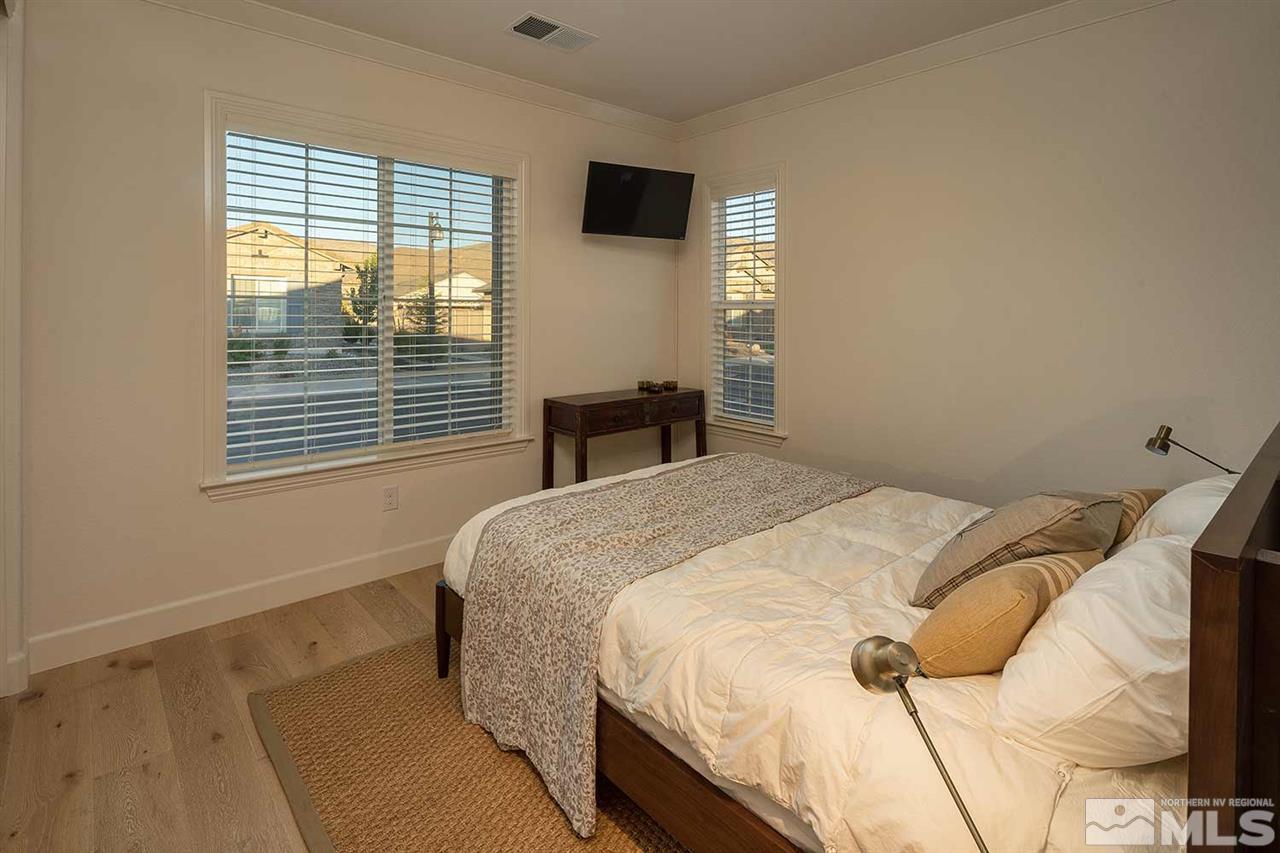 9523 Tencendur Lane Reno, NV 89521 - Photo 9 of 40 a bedroom with a bed and a window