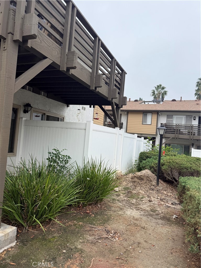 1340 West Lambert Road, Unit 85 La Habra, CA 90631 - Photo 2 of 17 a backyard of a house with plants and trees
