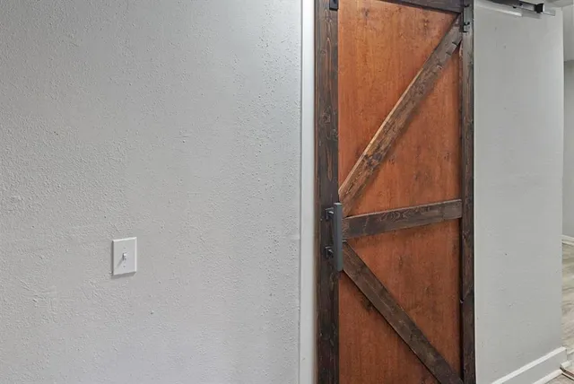 a view of staircase with wooden floor