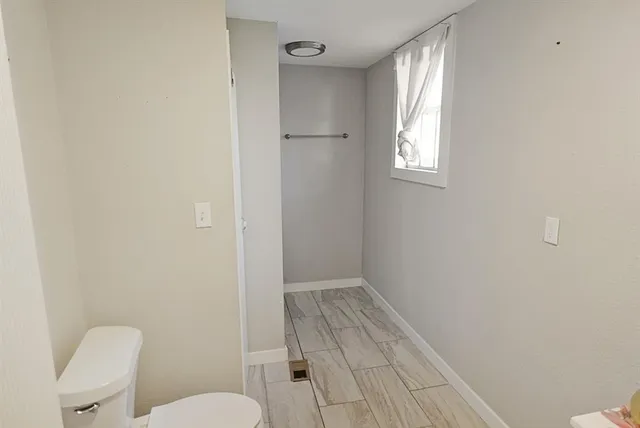 a bathroom with a toilet