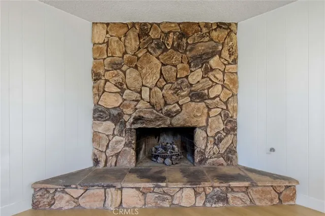 a kitchen with a sink stainless steel appliances and cabinets