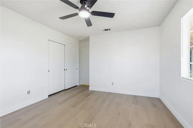 an aerial view of residential houses with outdoor space and river