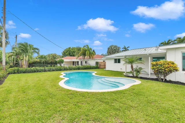 a view of pool and patio