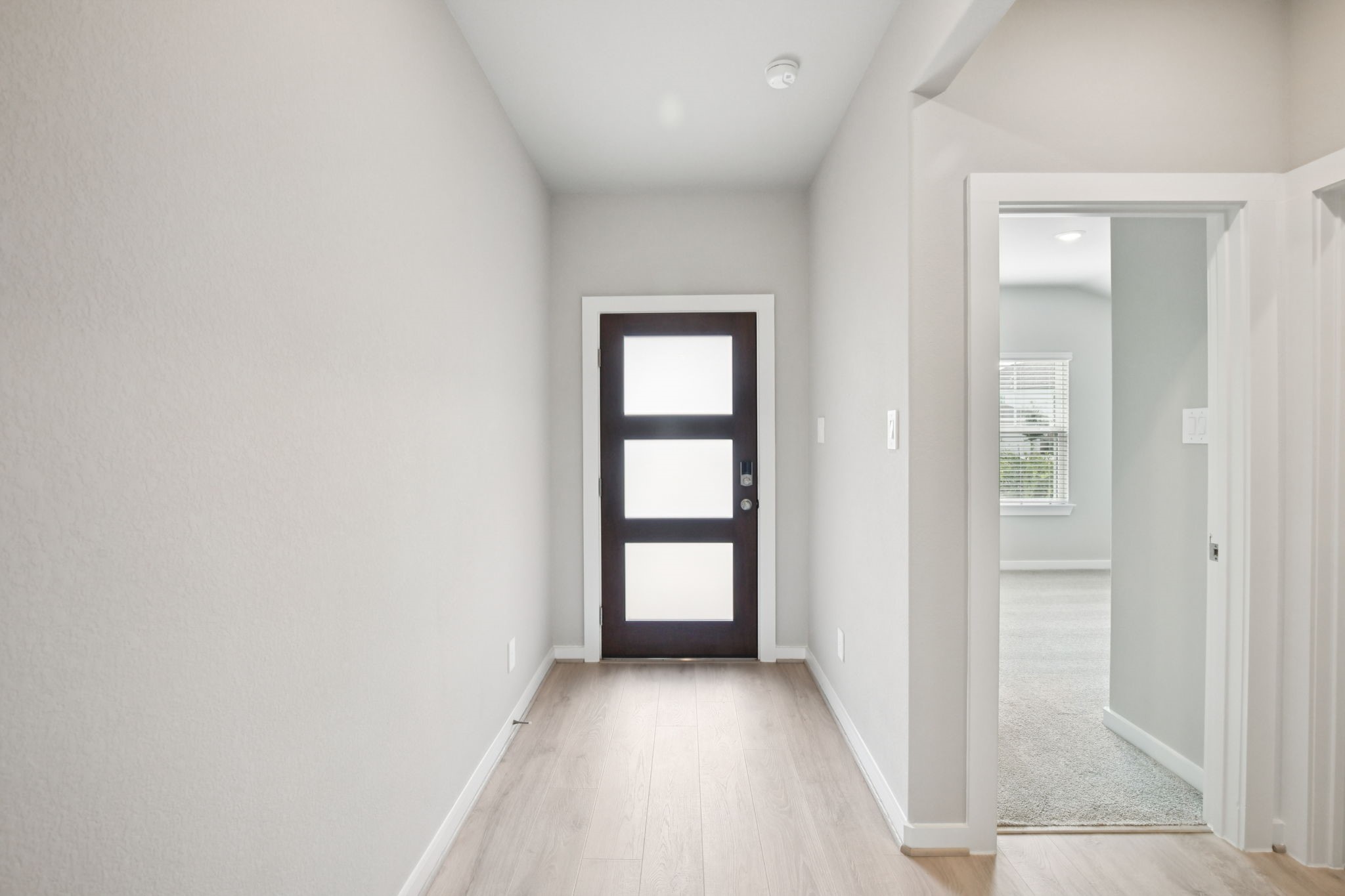1672 Hopson Ranch Drive Conroe, TX 77301 - Photo 15 of 44 an empty room with windows and closet