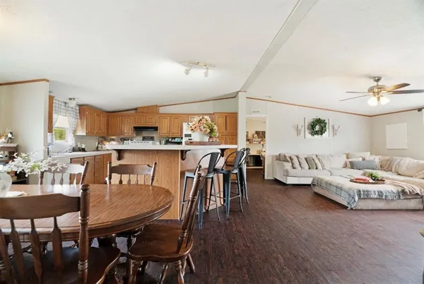 a living room with furniture and a table