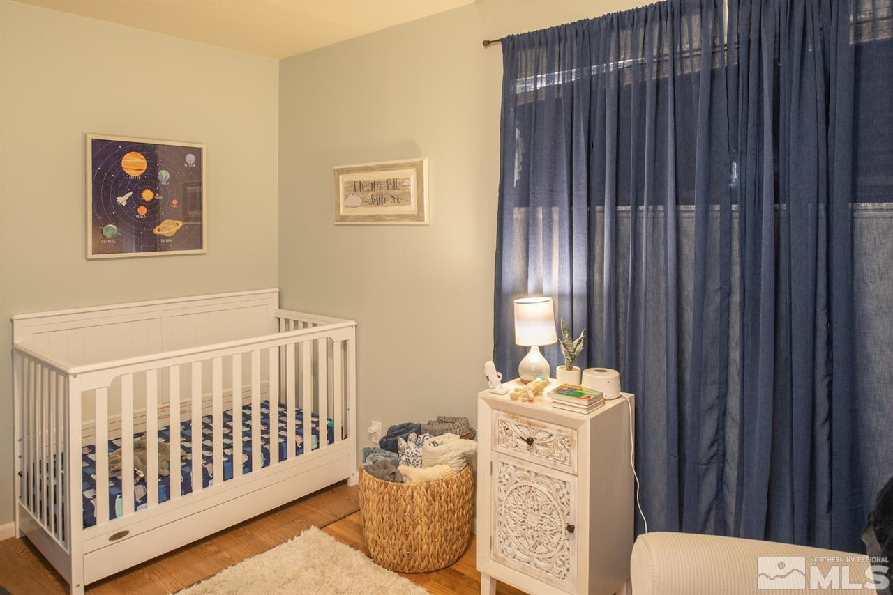 880 Beldon Way Reno, NV 89503 - Photo 12 of 20 a bedroom with furniture and a window