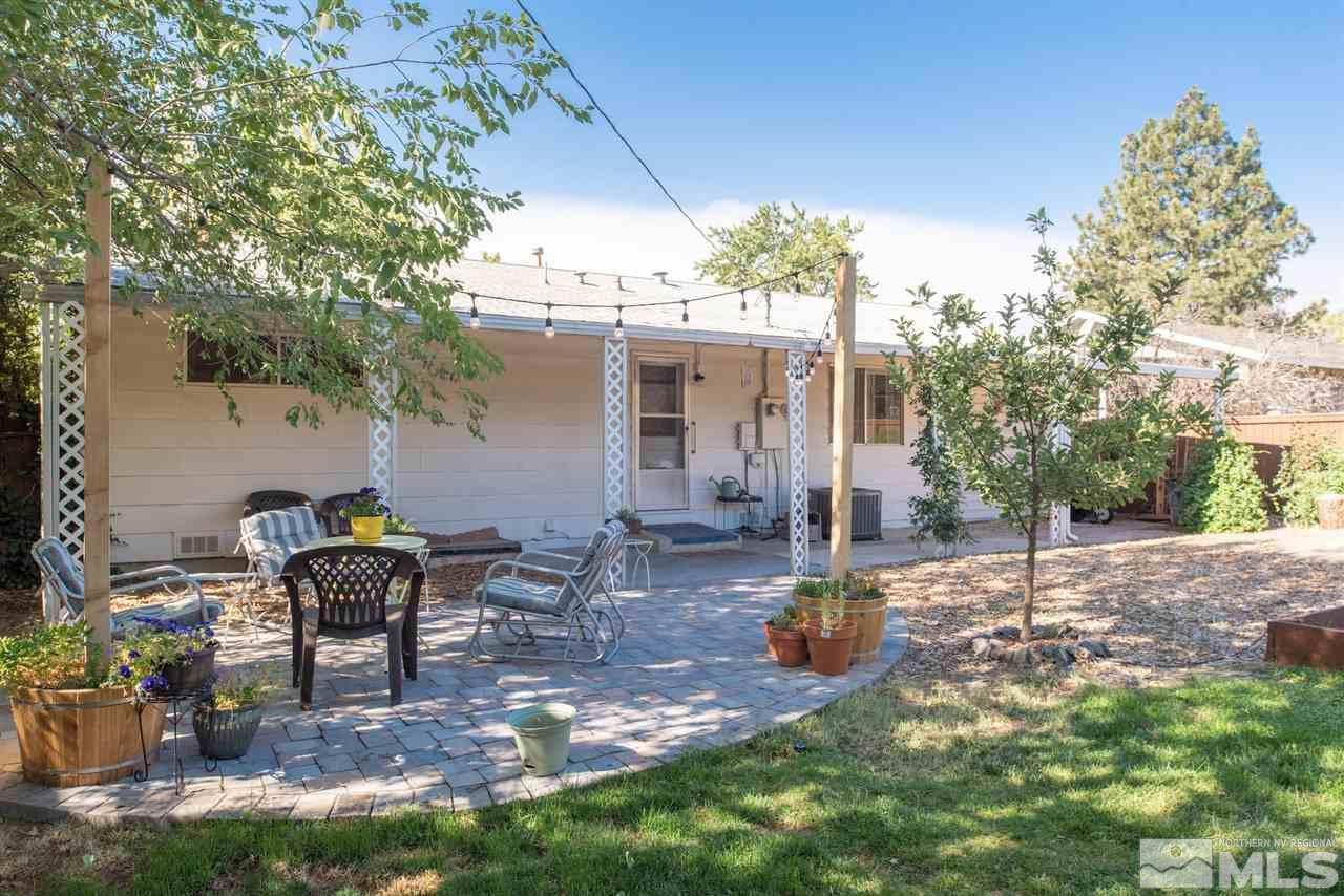 880 Beldon Way Reno, NV 89503 - Photo 18 of 20 a backyard of a house with table and chairs