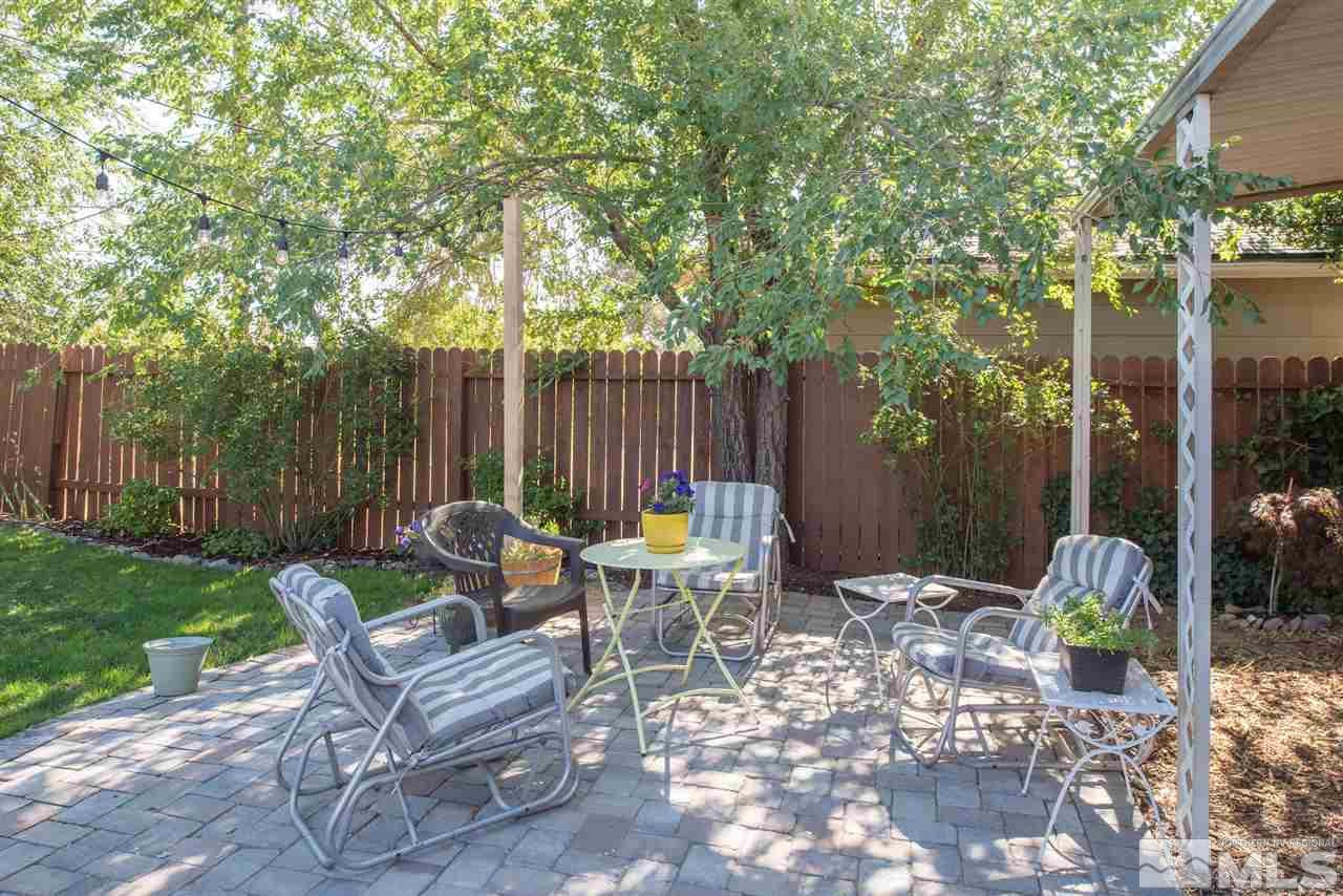 880 Beldon Way Reno, NV 89503 - Photo 19 of 20 a view of a patio with a table and chairs