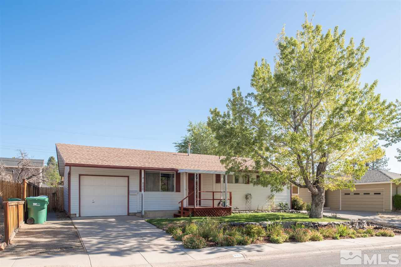 880 Beldon Way Reno, NV 89503 - Photo 3 of 20 a front view of a house with a garden
