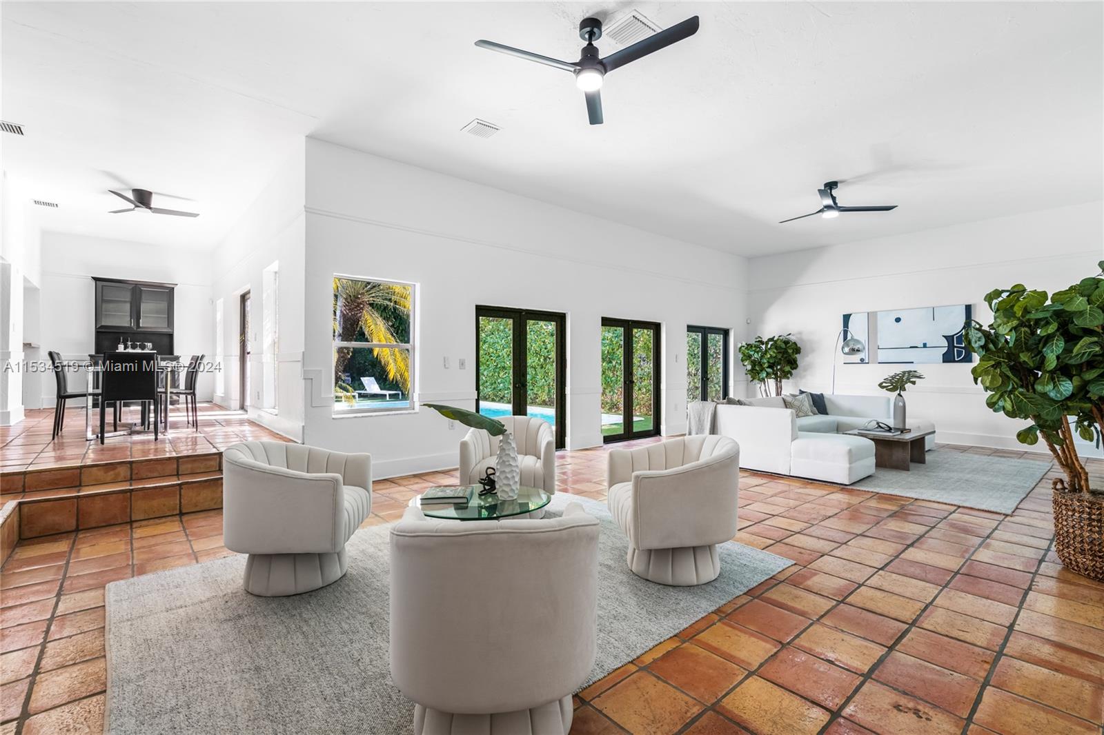 3871 South Le Jeune Road Miami, FL 33146 - Photo 11 of 49 a living room with furniture and a window