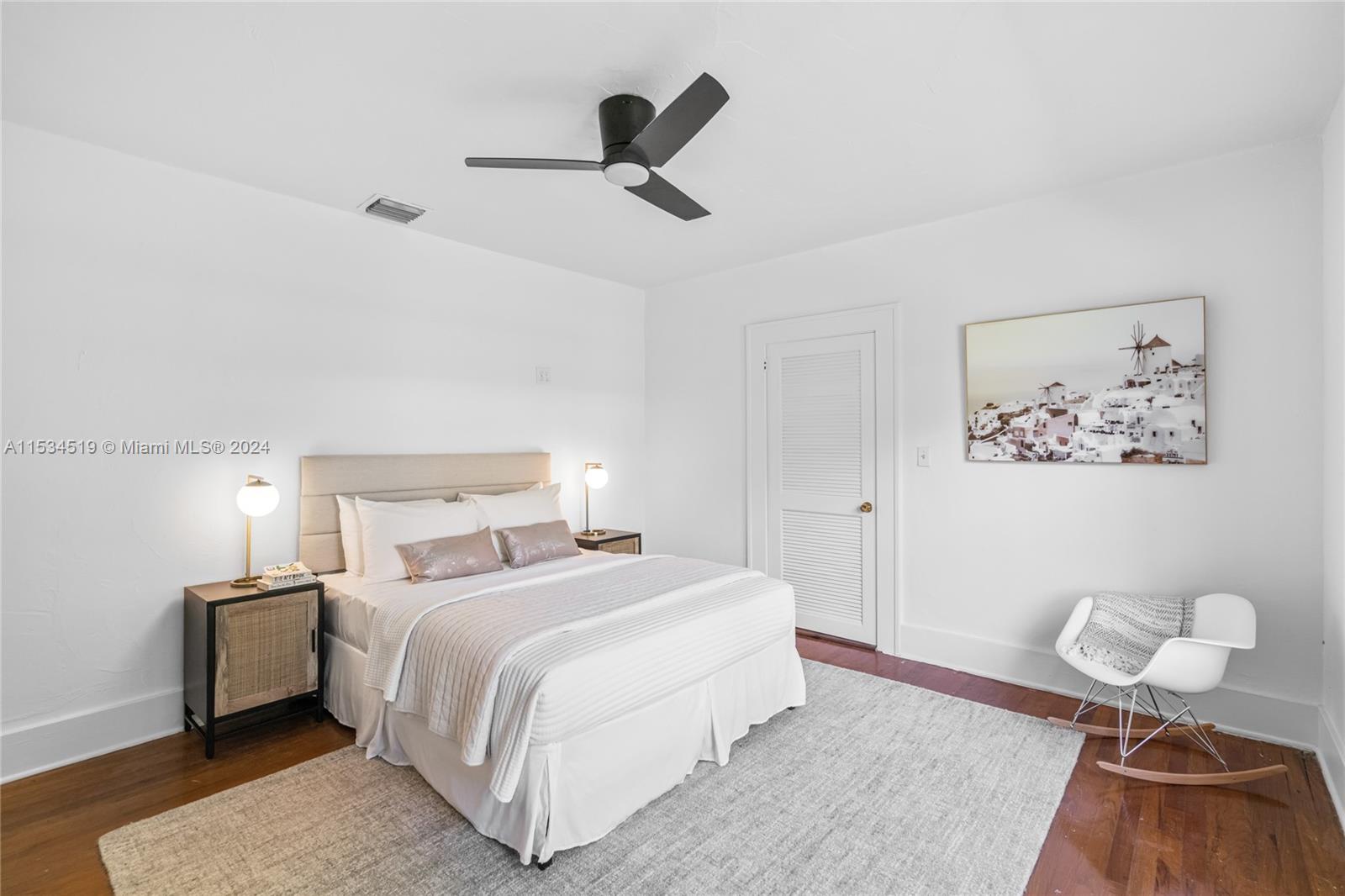 3871 South Le Jeune Road Miami, FL 33146 - Photo 20 of 49 a bedroom with a bed and painting on the wall
