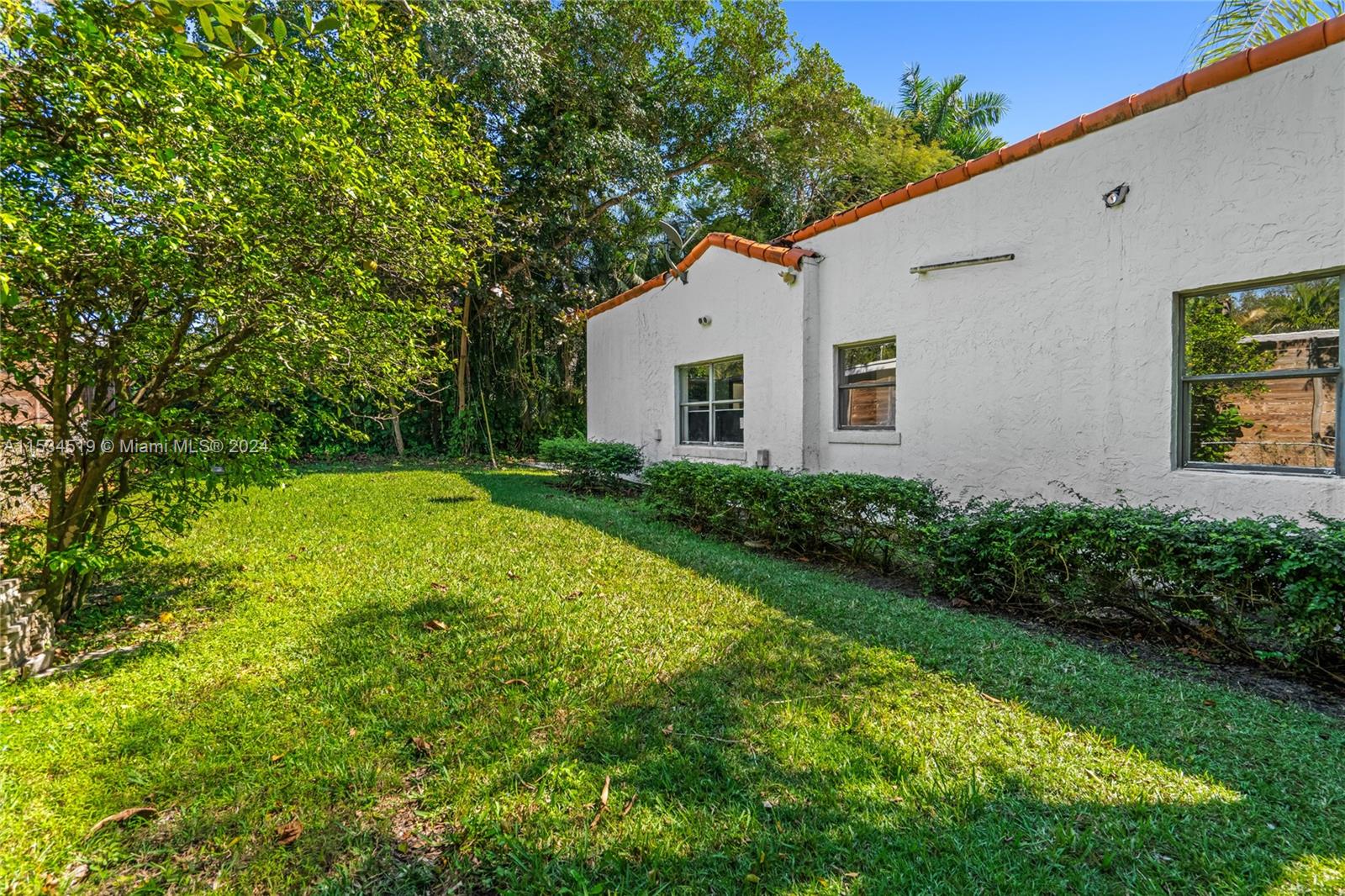 3871 South Le Jeune Road Miami, FL 33146 - Photo 33 of 49 a house view with a garden space
