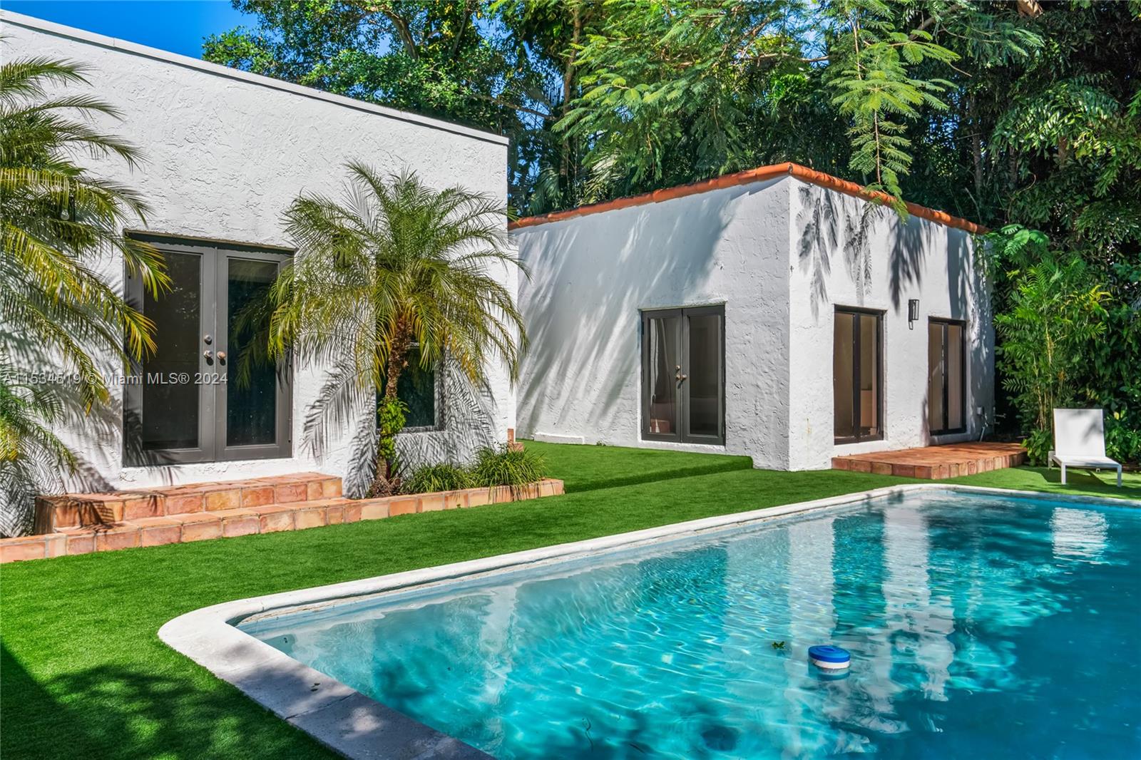 3871 South Le Jeune Road Miami, FL 33146 - Photo 41 of 49 a front view of house with yard