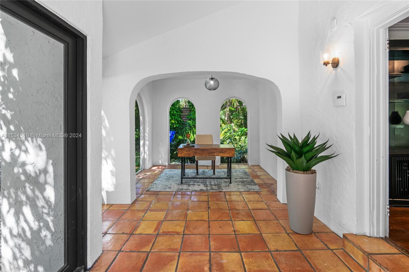 3871 South Le Jeune Road Miami, FL 33146 - Photo 42 of 49 a lobby with furniture and window