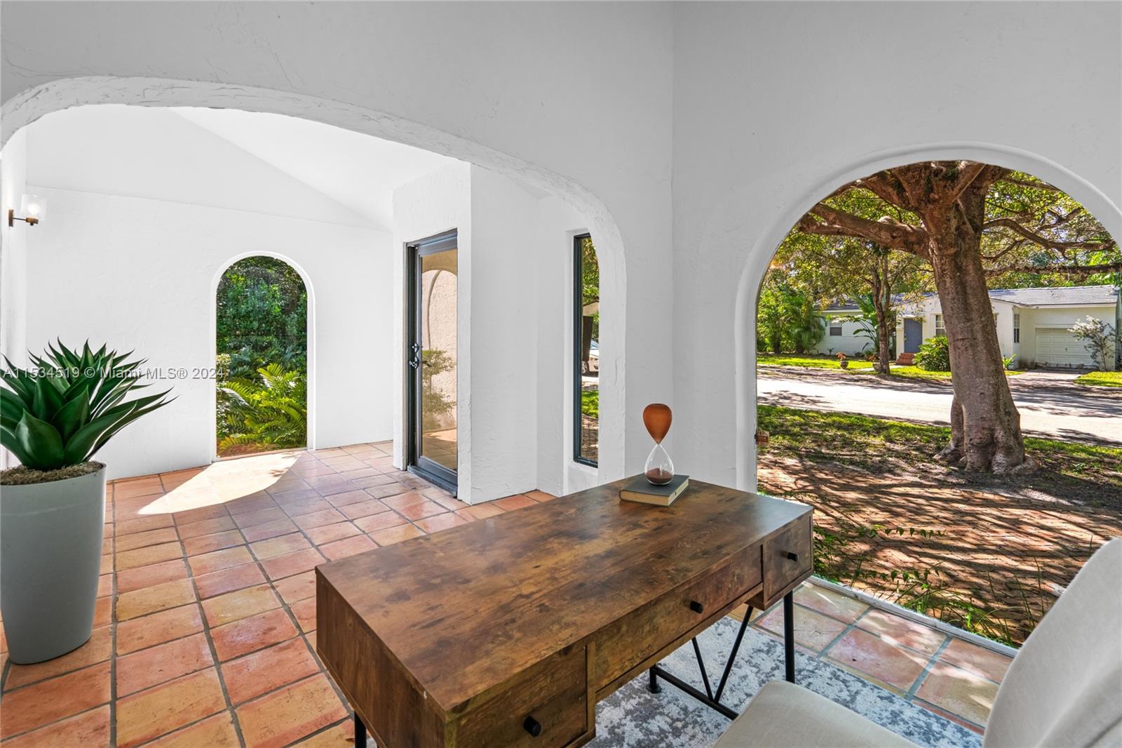 3871 South Le Jeune Road Miami, FL 33146 - Photo 43 of 49 a view of a house with a porch