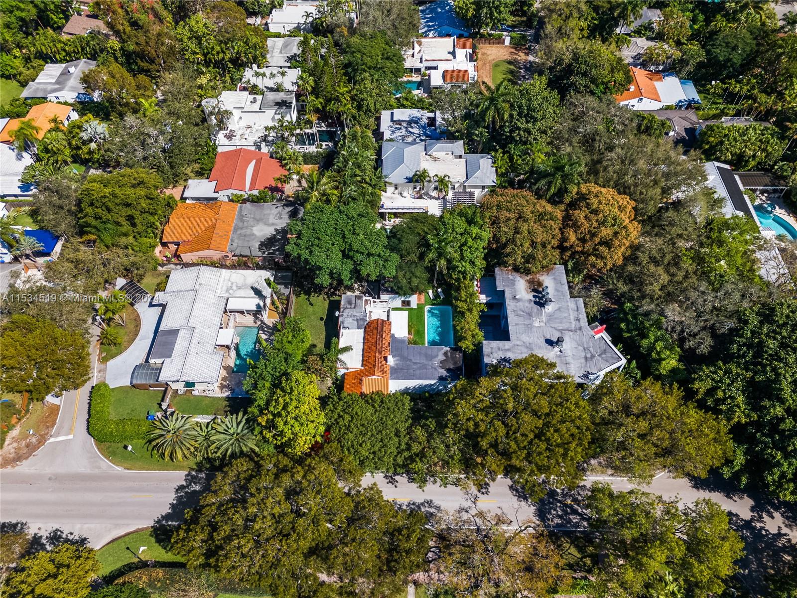 3871 South Le Jeune Road Miami, FL 33146 - Photo 47 of 49 an aerial view of residential houses with outdoor space and street view