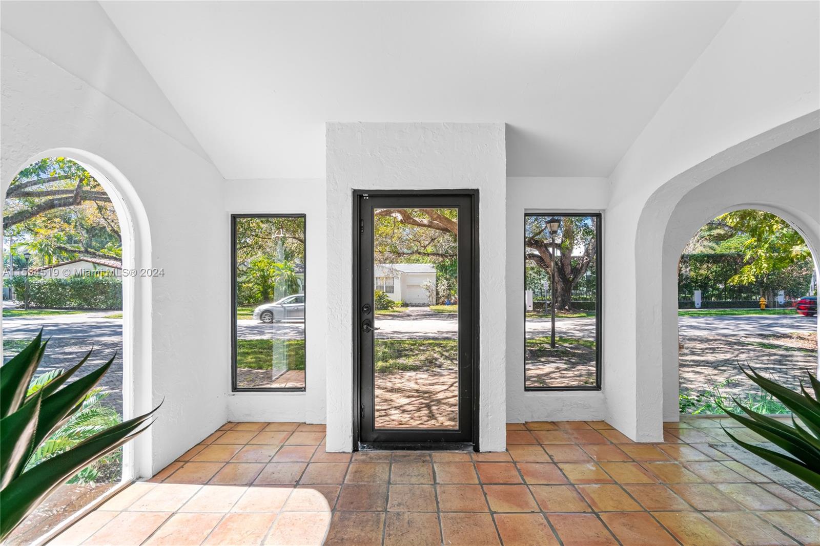 3871 South Le Jeune Road Miami, FL 33146 - Photo 5 of 49 a living room with furniture and a large window