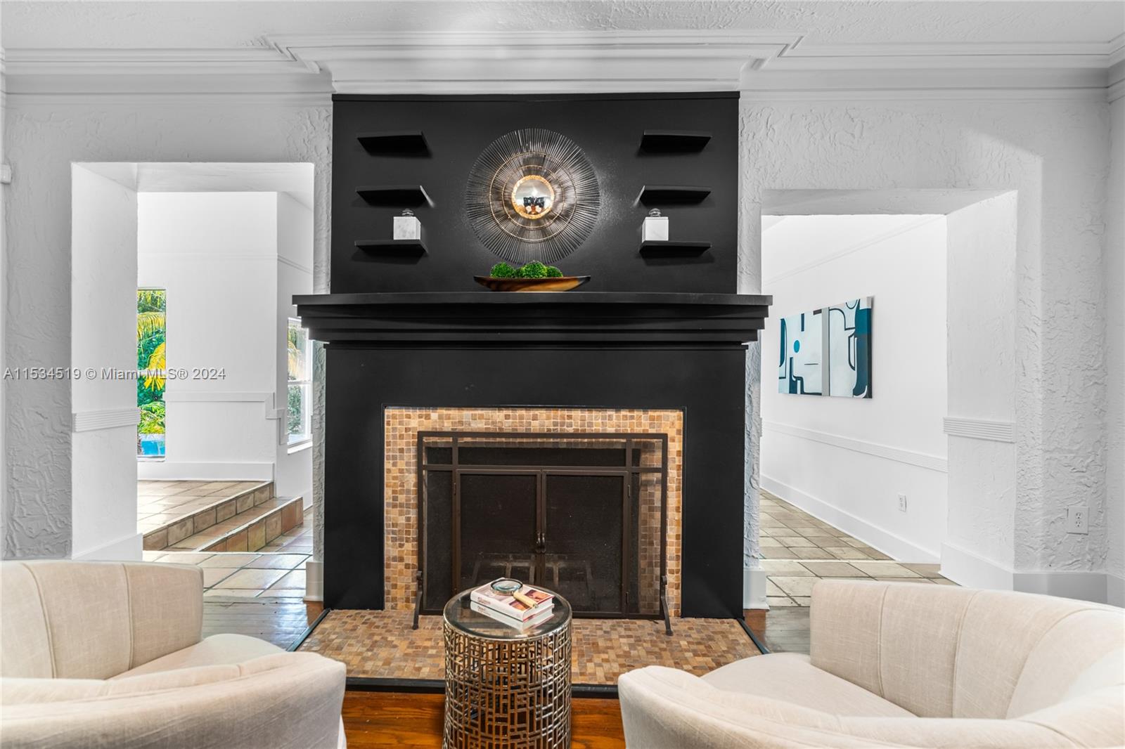 3871 South Le Jeune Road Miami, FL 33146 - Photo 7 of 49 a living room with furniture and a fireplace
