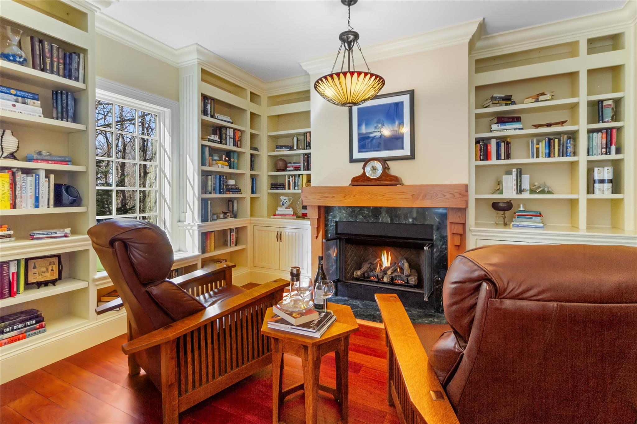 24 Country Club Lane Briarcliff Manor, NY 10510 - Photo 11 of 42 a living room with furniture and a fireplace