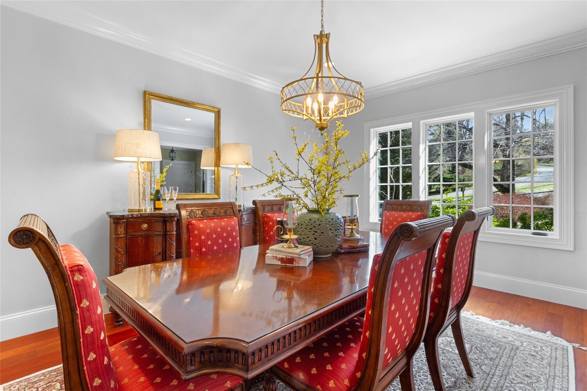24 Country Club Lane Briarcliff Manor, NY 10510 - Photo 12 of 42 a view of a dining room with furniture wooden floor and chandelier