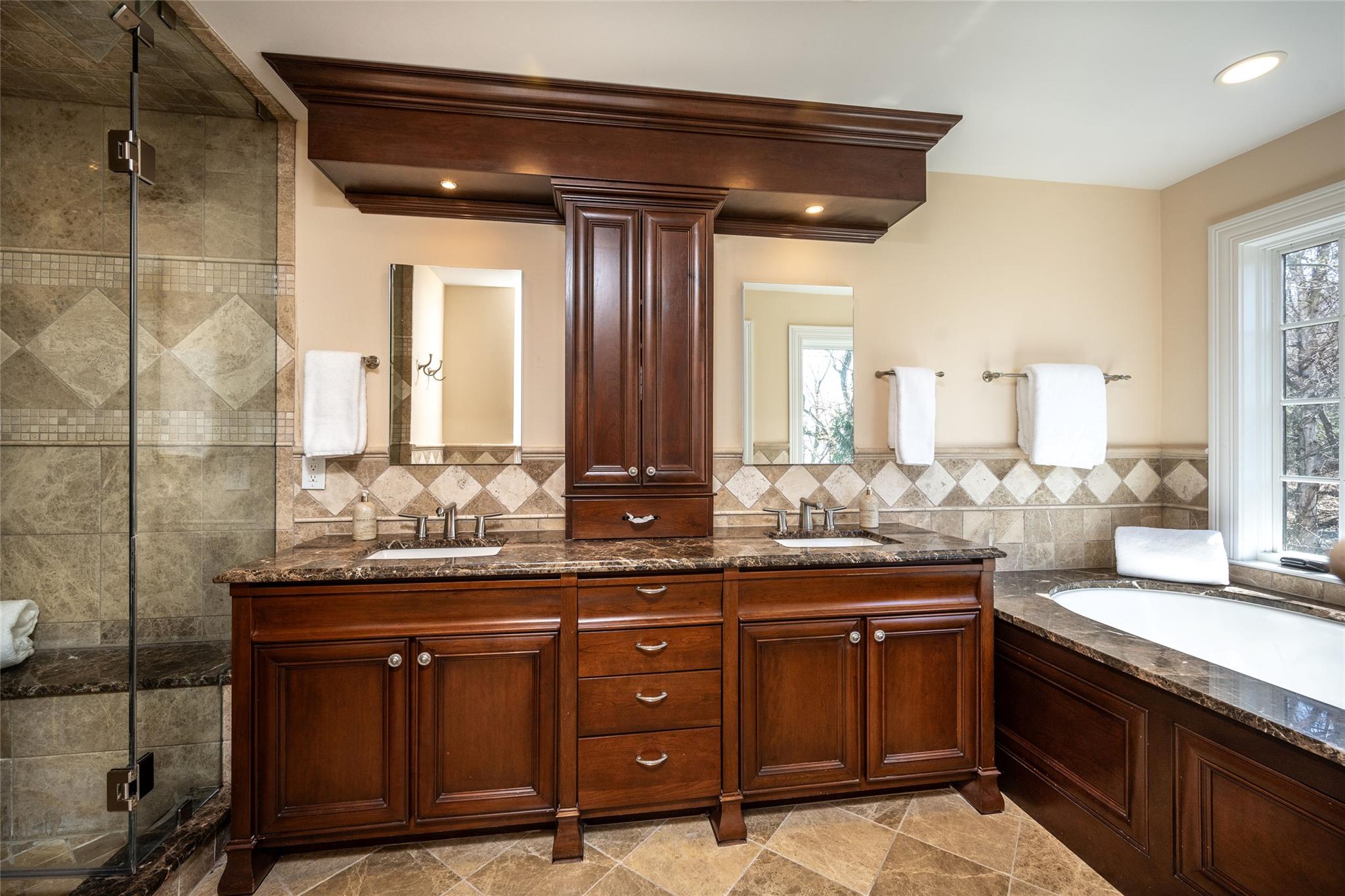 24 Country Club Lane Briarcliff Manor, NY 10510 - Photo 18 of 42 a bathroom with a granite countertop sink and a mirror
