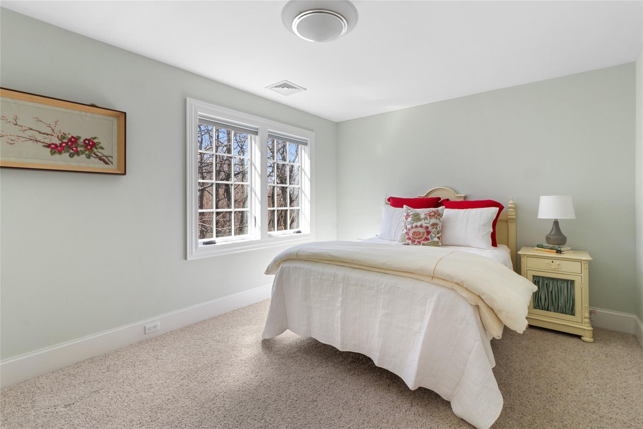 24 Country Club Lane Briarcliff Manor, NY 10510 - Photo 26 of 42 a bedroom with a bed and a window