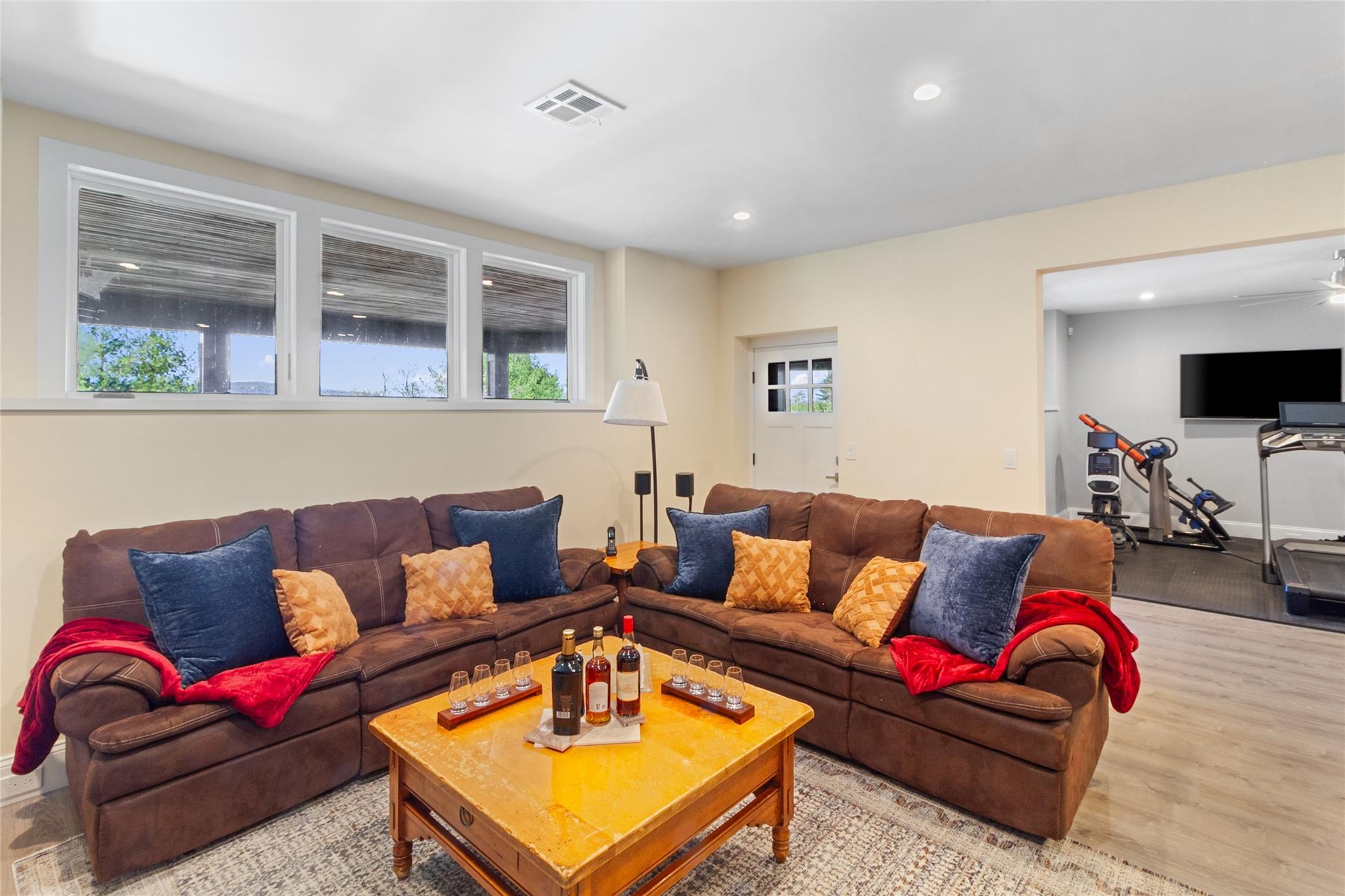 24 Country Club Lane Briarcliff Manor, NY 10510 - Photo 30 of 42 a living room with furniture and a flat screen tv