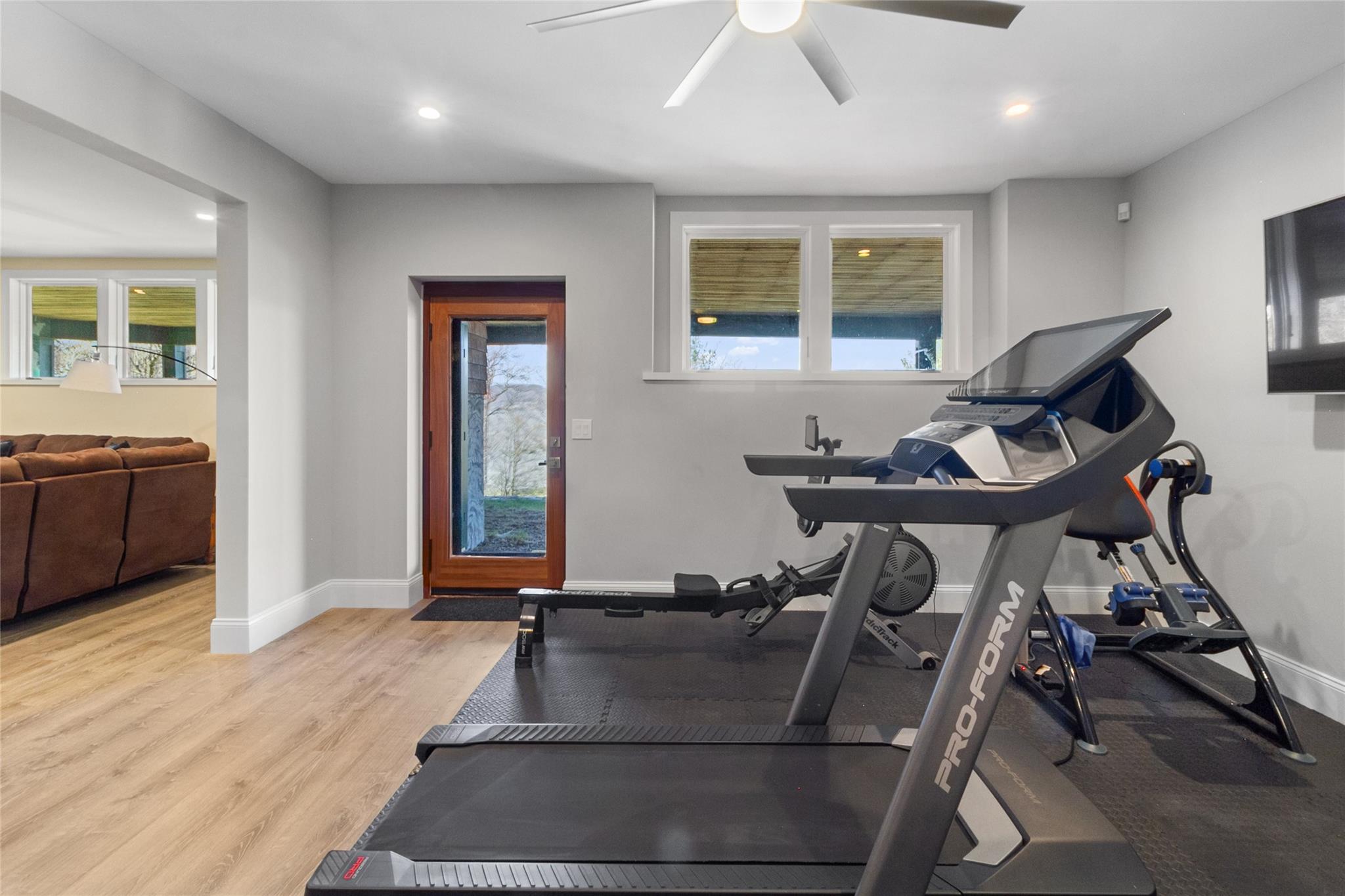 24 Country Club Lane Briarcliff Manor, NY 10510 - Photo 31 of 42 a living room with furniture a dining table and chairs