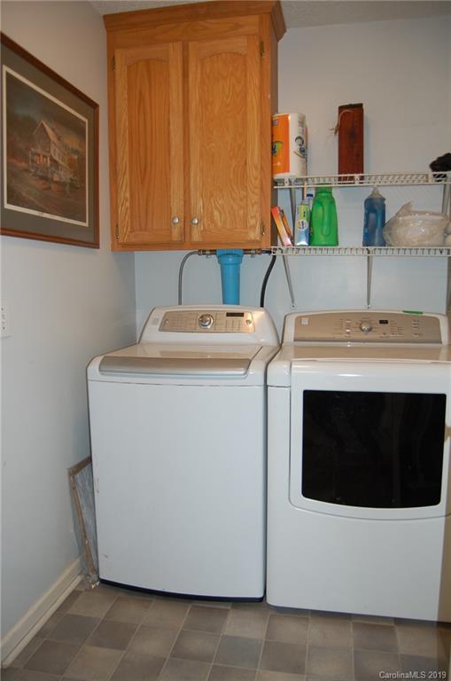 4385 Rimer Road Concord, NC 28025 - Photo 14 of 34 a utility room with dryer and washer