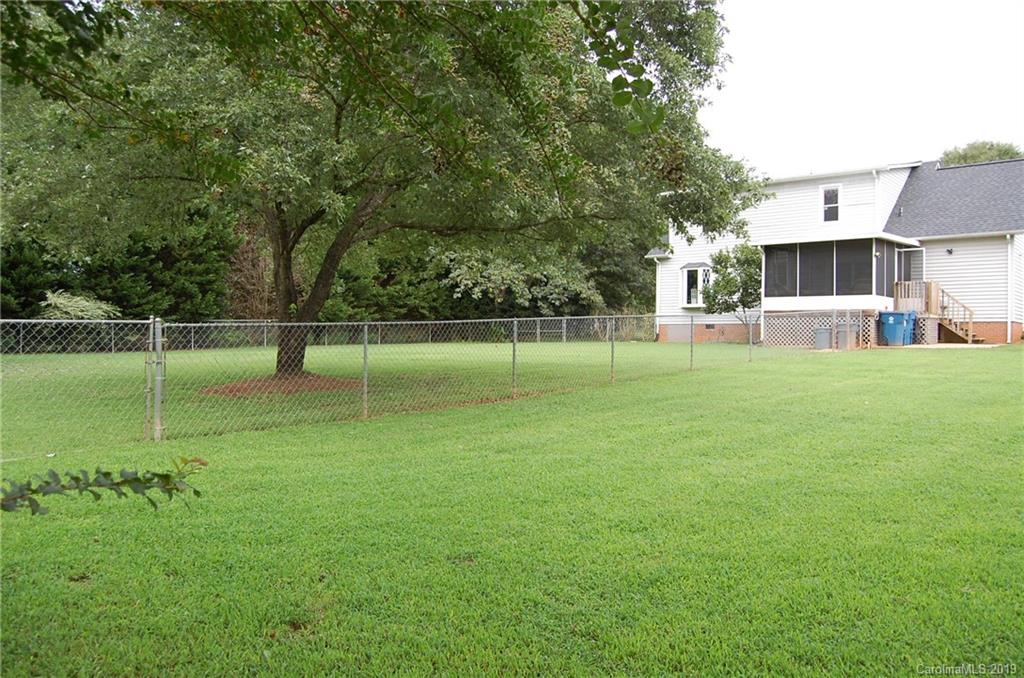 4385 Rimer Road Concord, NC 28025 - Photo 3 of 34 a view of a park with a large tree