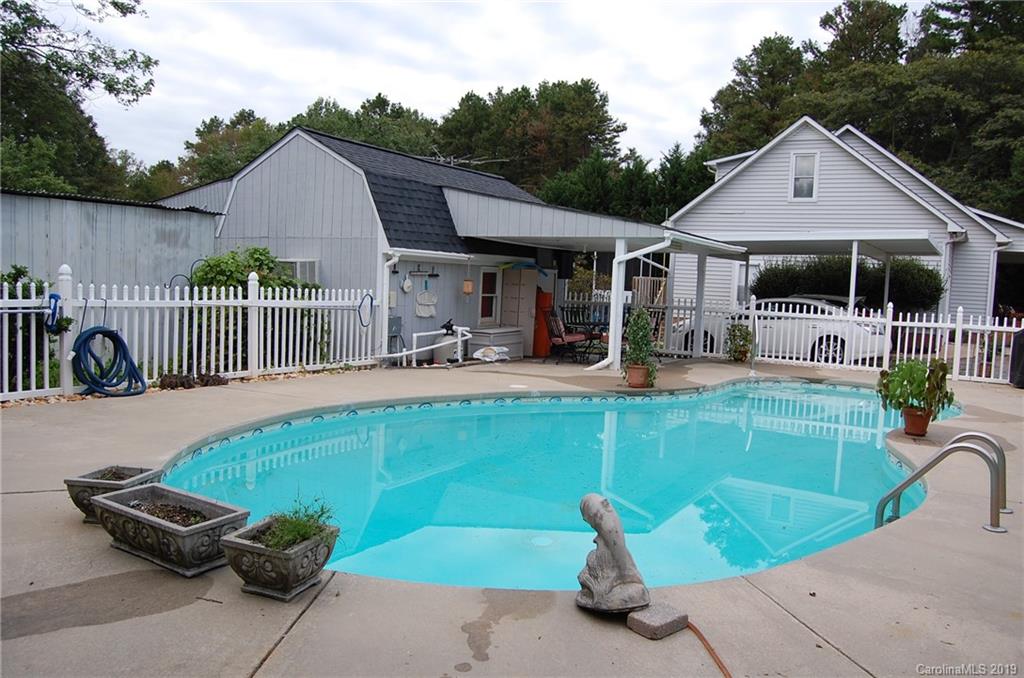 4385 Rimer Road Concord, NC 28025 - Photo 5 of 34 swimming pool view with a seating space