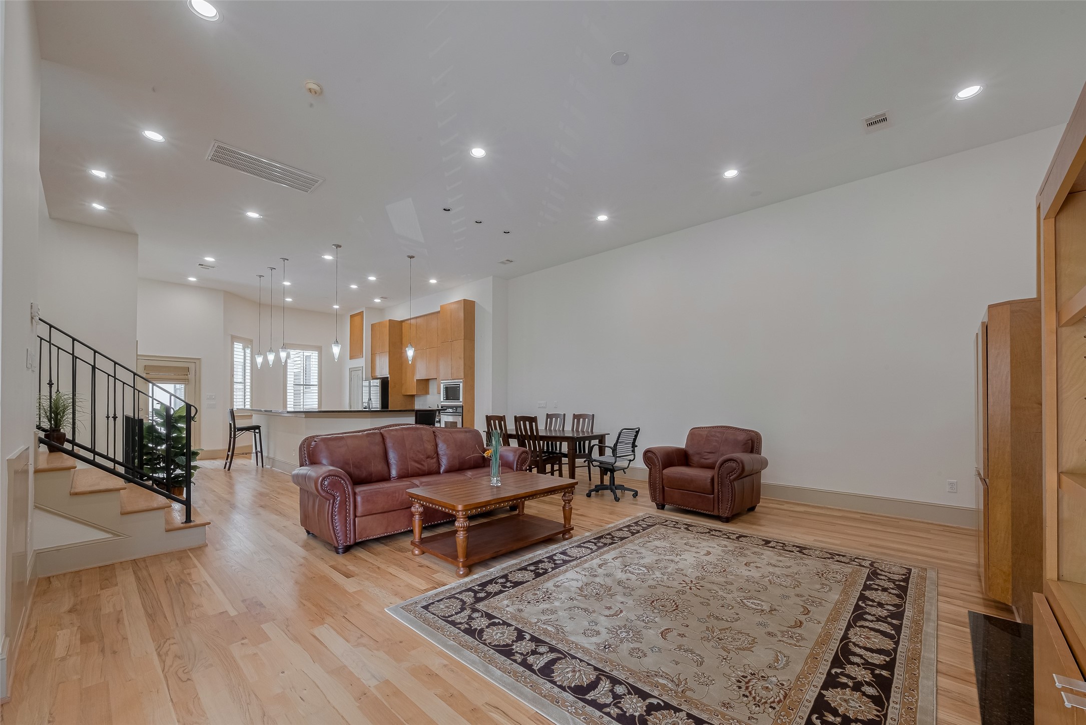 2034 Colquitt Street, Unit A Houston, TX 77098 - Photo 14 of 30 a living room with furniture and a rug