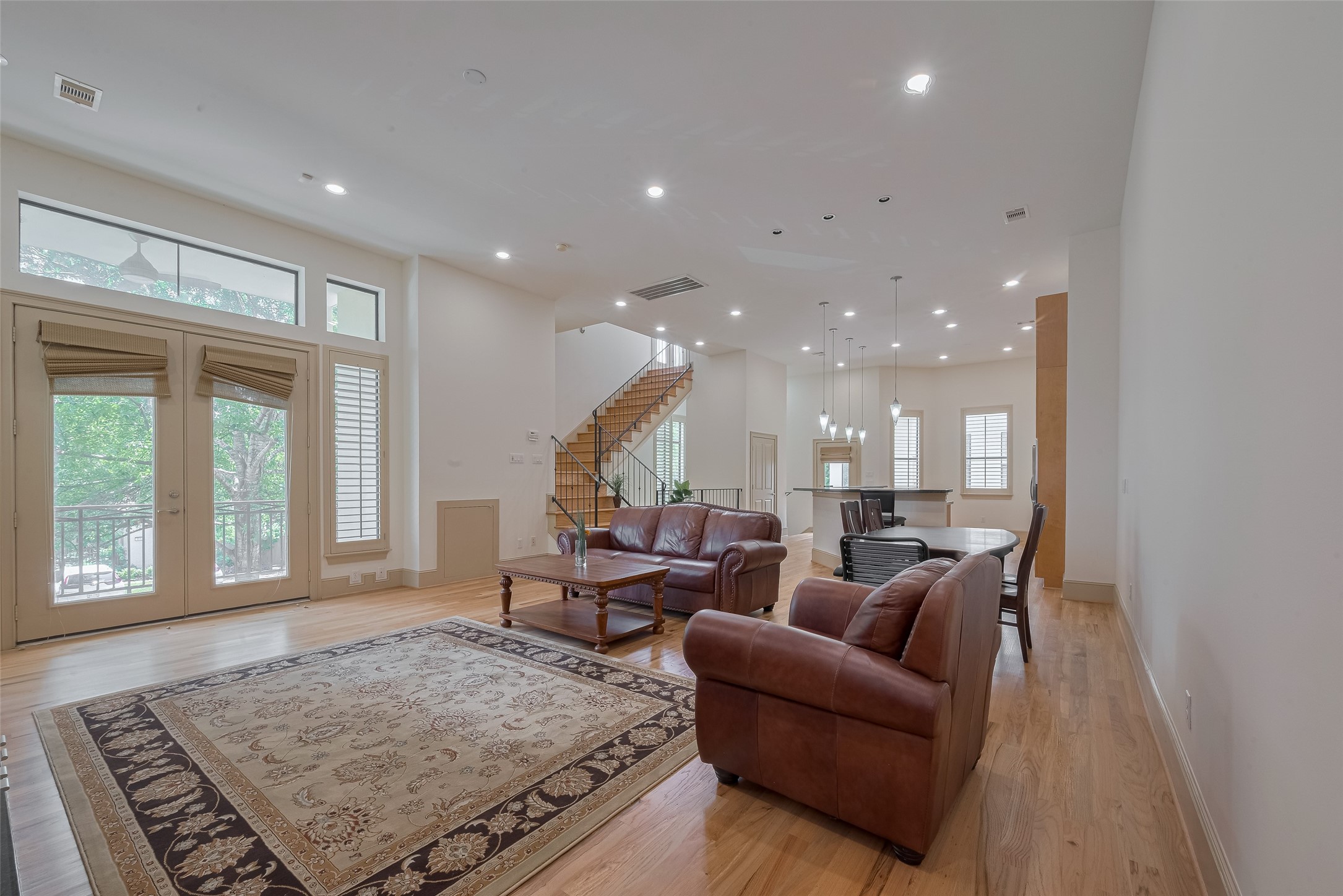 2034 Colquitt Street, Unit A Houston, TX 77098 - Photo 16 of 30 a living room with furniture and a rug