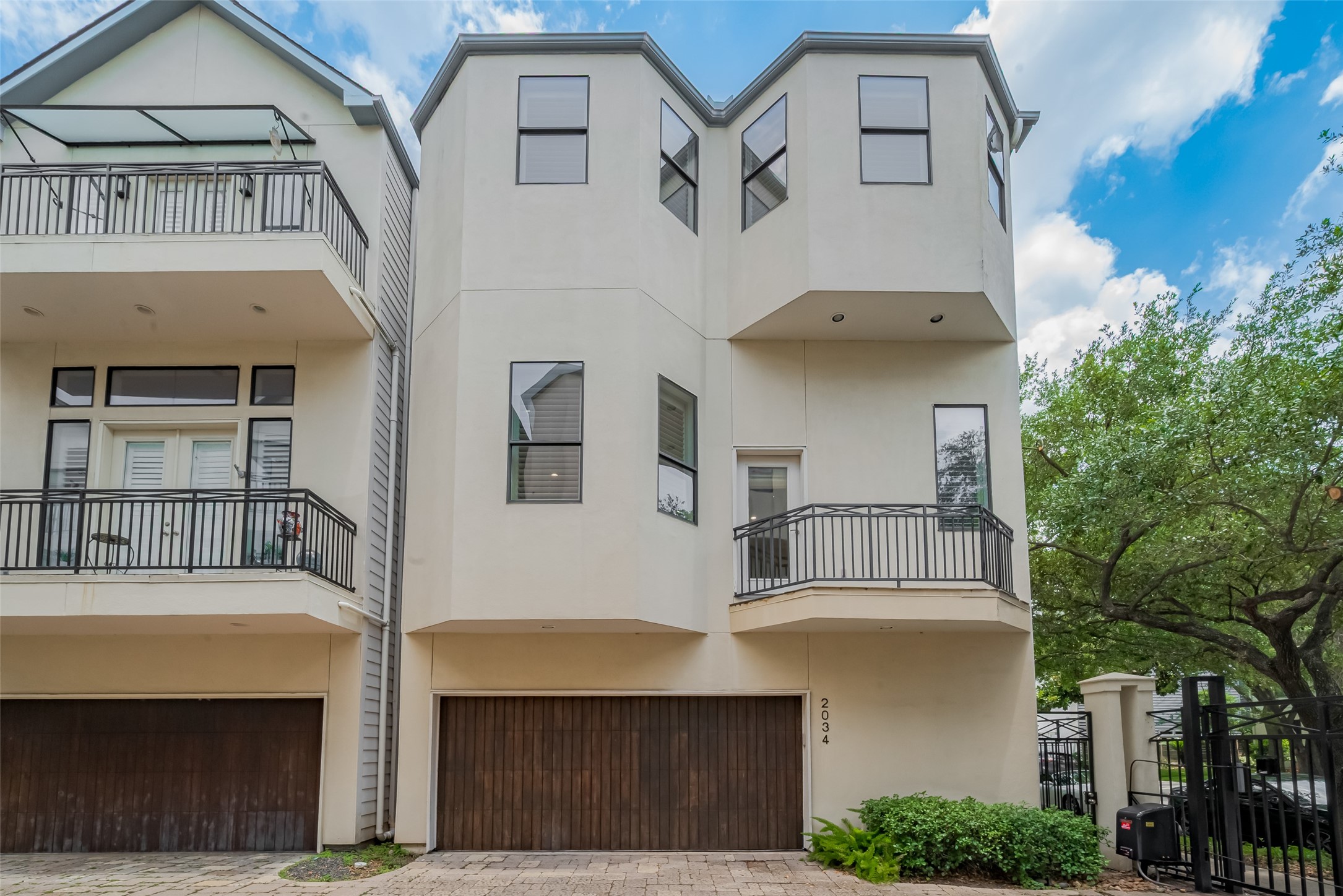2034 Colquitt Street, Unit A Houston, TX 77098 - Photo 2 of 30 a front view of a house with a balcony
