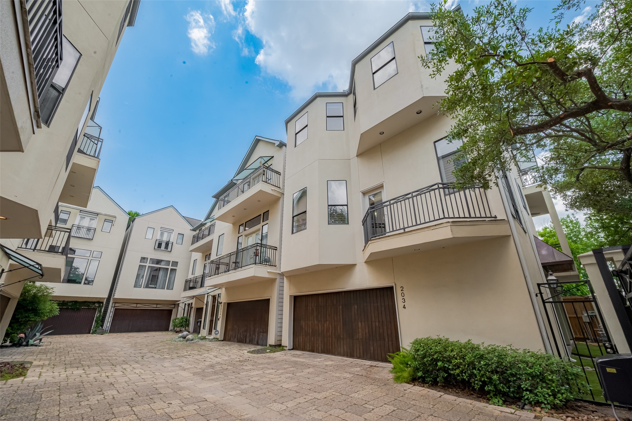 2034 Colquitt Street, Unit A Houston, TX 77098 - Photo 3 of 30 a view of a white building among the street