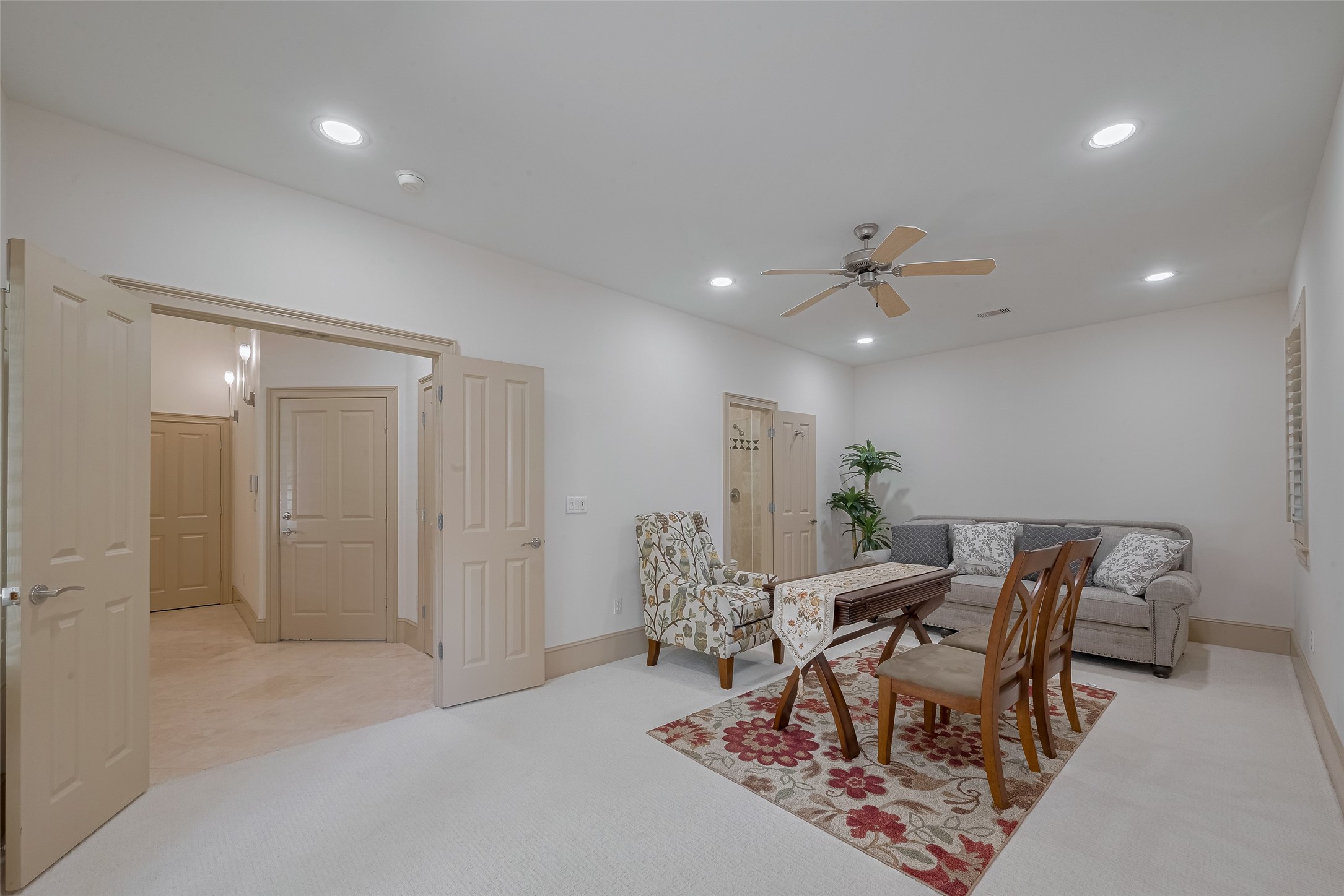 2034 Colquitt Street, Unit A Houston, TX 77098 - Photo 7 of 30 a dining room with furniture and a chandelier