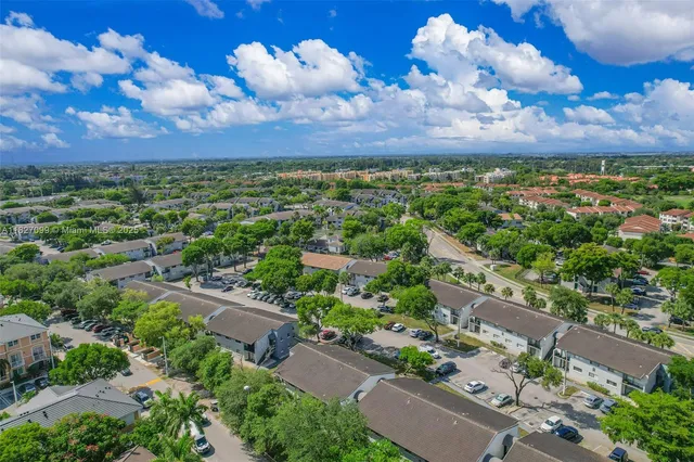 a view of a lake in middle of the town