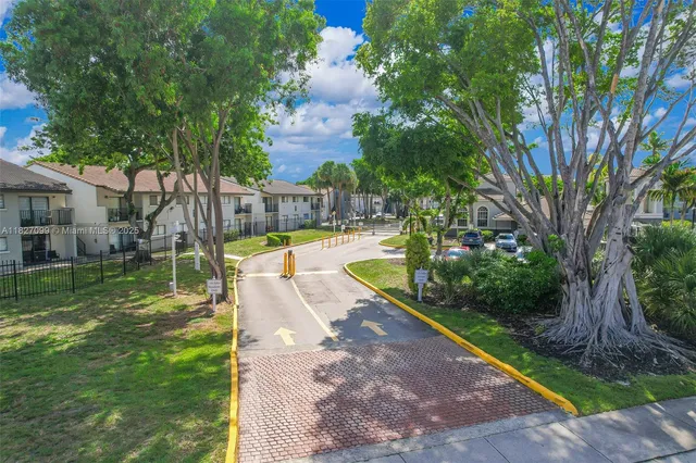 a view of a backyard with plants