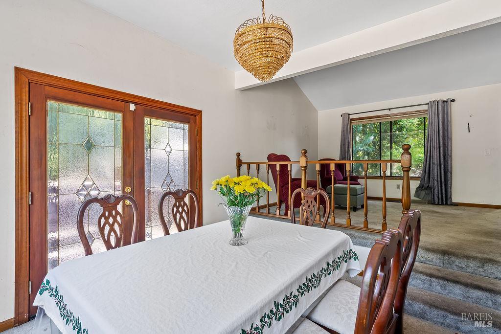 715 Placer Court Santa Rosa, CA 95401 - Photo 9 of 37 a view of a dining room with furniture window and wooden floor