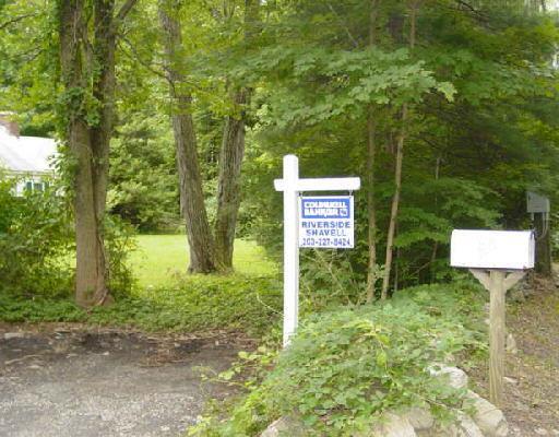 55 Steep Hill Road Weston, CT 06883 - Photo 1 of 1 a sign that is sitting in front of a tree
