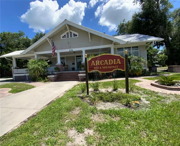a sign on the side of a house